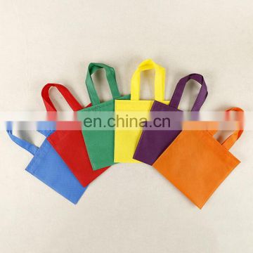 Factory price guangzhou supplier cheap colorful non woven fabric waterproof shopping bag