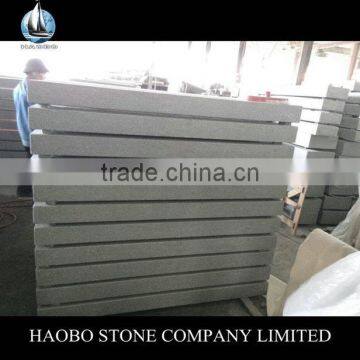 Flamed cheap grey granite stairs and risers, paving stone and environment