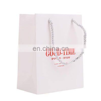 Black Embossed Gold Logo Paper Shopping Bag With Handle photo-2