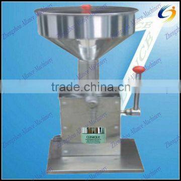 hand operated cosmetic cream filling machine