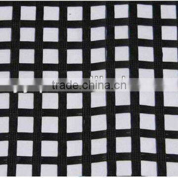 Warp knitted polyester geogrid