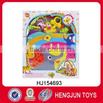 baby musical carpet with plastic rattle toy and plush animal toy