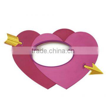 A arrow through heart photo frame for wedding photo frame