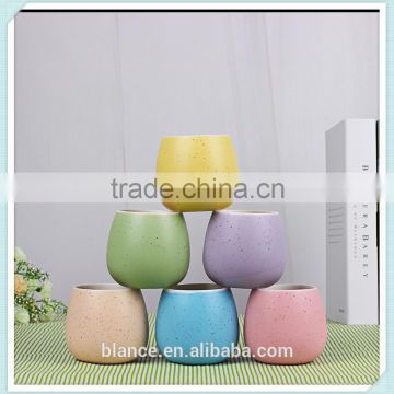 modern ceramic colorful planter with speckle