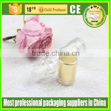 Clear glass essential oil roll on bottle with aluminum cap