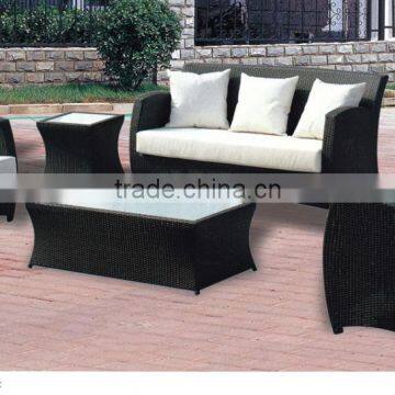 Black fabric covered sofa set with rattan wicker material chair set