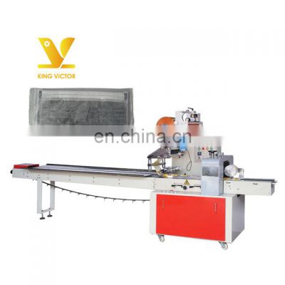 Semi-automatic packing machine for disposable medical face mask