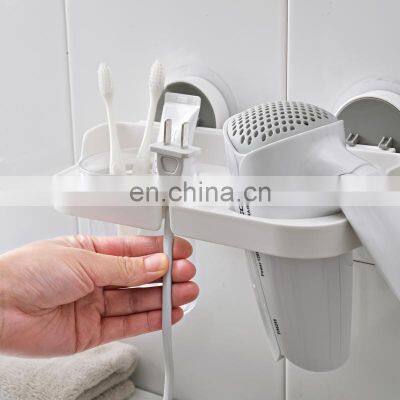 2020 Taizhou New Arrival Quality Hair Dryer Holder Popular Adhesive Wall Mounted Hair Dryer Stand Holder photo-2