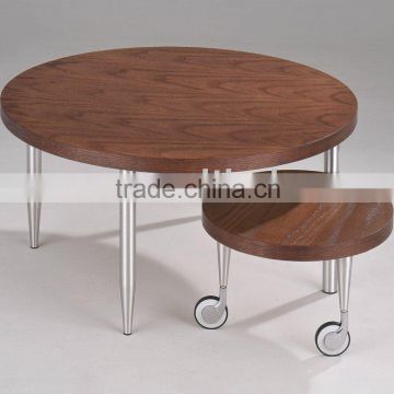 Round wooden side table with wheel