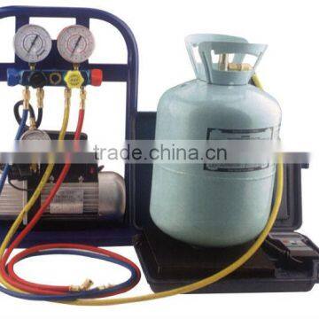 Portable regrigerant recovery and filling machine