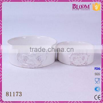 white glazed round ceramic pet food bowl