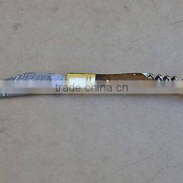 A SCENIC ROSE WOOD HANDLE DAMASCUS STEEL LAGUIOLE KNIFE WITH CORK SCREW