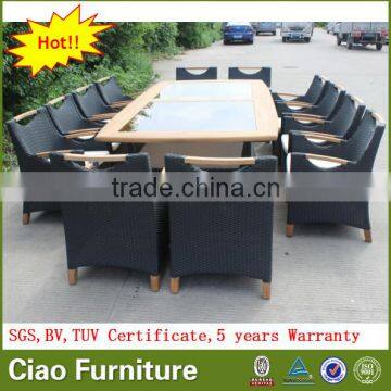 Luxury Outdoor Extended Glass Dining Table and Teakwood Chairs photo-3