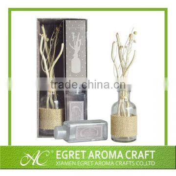 Popular customized glass bottle with rattan sticks for automatic sola flower fragrance diffuser