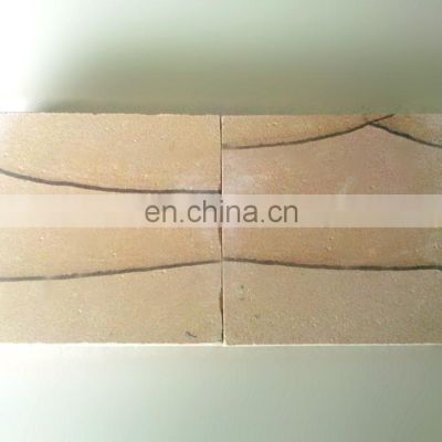 sandstone cladding, rusty yellow sandstone