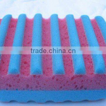 Colorful cleaning sponge in kitchen