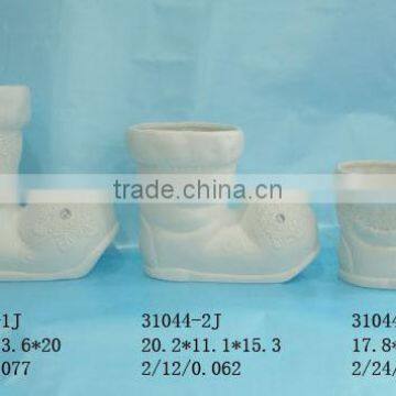 Porcelain white boot shaped plant pot