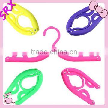 Custom Design Portable Folding Plastic Clothing Coat Short Shirt Pants Clothes Hanger Travel Foldable Hanger photo-4