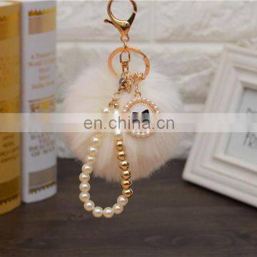 2021 Год Оптовая продажа индивидуально изготовленных роскошных ключей с шерстяными шариками, перловыми ключницами, ключницами с пупырышками и ленточными бантиками для женских сумок. Высокое качество. photo-2