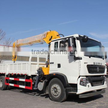 howo 6*4 20T crane truck gets up with the heavy and transport vehicle truck with loading crane