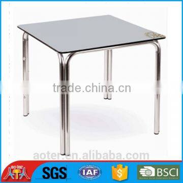 Aluminum and HPL compact dining table design