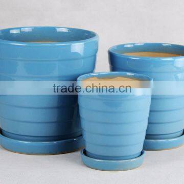 Light blue ceramic pot with plate