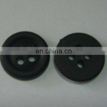 plastic button in black color