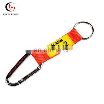 Key tag carabiner with strap and rubber patch with printed logo