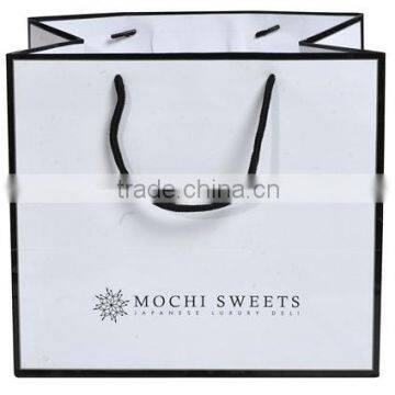 Brightly Red Gift Paper Bag With pp Rope Handles and Hangtag