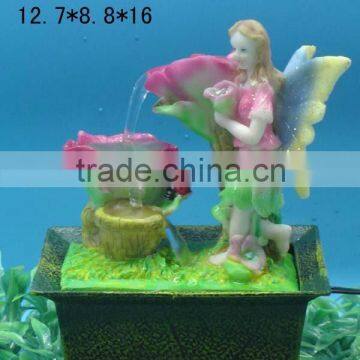 Polyresin fairy with battery operated fountain