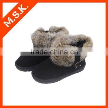Black faux fur surrounded with buckle ankle snow boot
