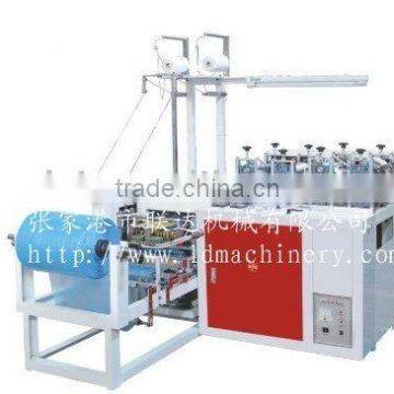 Plastic shoe cover machine