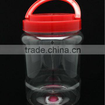 800g cheap round clear plastic candy jar with hand lift lid