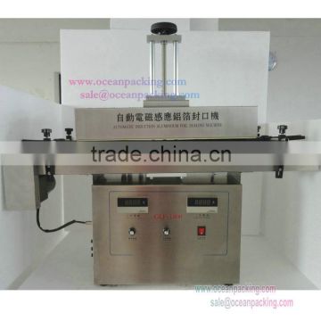 Automatic pet bottle aluminum foil sealing machine