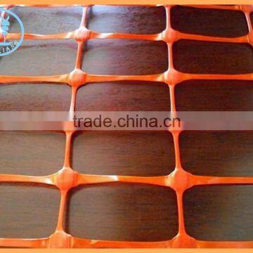 Orange road safety barrier fence netting