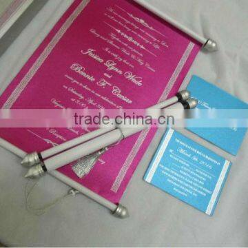 beautiful pink scroll wedding invite with matching inserts in blue colour for wedding stationers