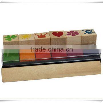 colorful wooden stamp and stamp pads