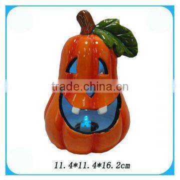 Ceramic halloween pumpkins with green leaf