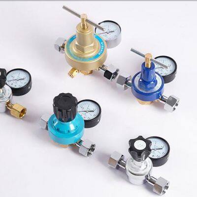 Two stage tank series pressure reducer