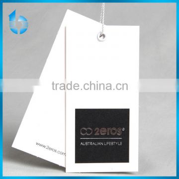 White card paper hangtag with black printted and logo sliver stamping for men 's trousers