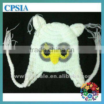 Children knitting cap with earflap