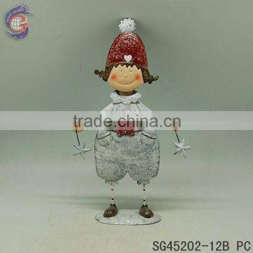 interior xmas decorations items with metal girl holding stars