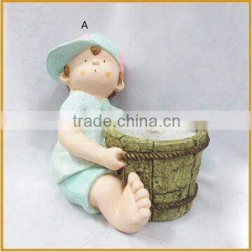 hotsale polyresin baby boy figurines with pots