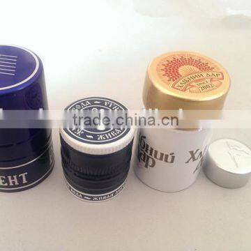 Aluminum closure with plastic insert