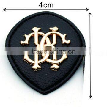 Black/white PU leather sew on patches Fashion labels with metal logo clothing label for jeans/jacket PLB-001