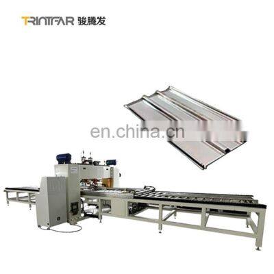 Automatic welding production line for elevator door panel reinforcement