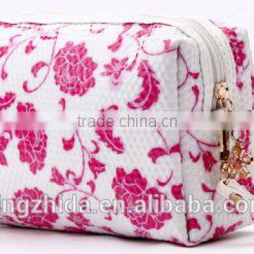 Blue and White Diamond Pattern Cosmetic Bag in Hand photo-4