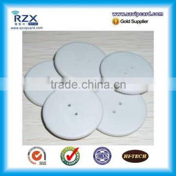 Reusable HF washable RFID laundry tag