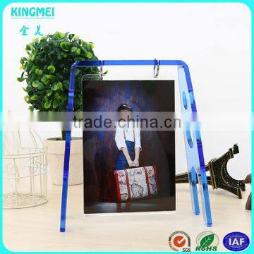 KM-VP94 Creative design scrolling acrylic swing shape photo moving picture frame