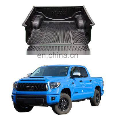Isuzu Dmax Ford F-150 Toyota Hilux Vigo Revo Nissan Navara NP300 D40 Inside the trunk of a popular pickup truck at the factory